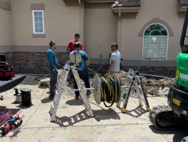 Workers planning for power lines